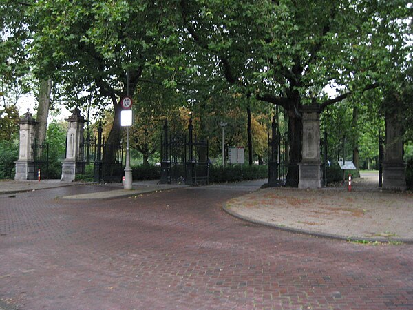Wrought iron entrance gate with four steps